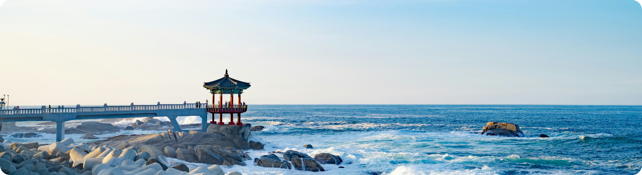 Korean coastal pavilion above breaking waves — the country now listing its own semiconductor ETF in New York.