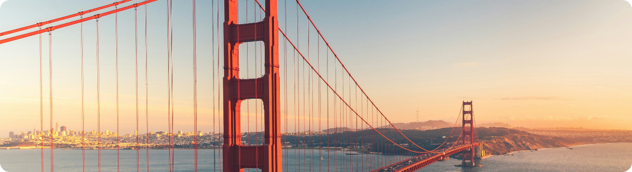 The Golden Gate Bridge at sunset — American infrastructure of the kind new ETFs promise to rebuild
