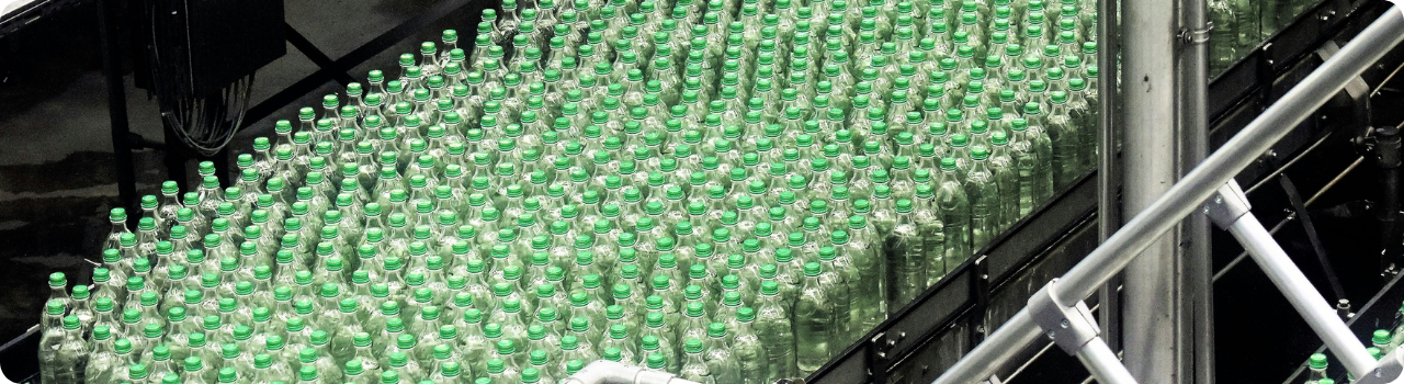 Identical products moving along a factory conveyor belt.
